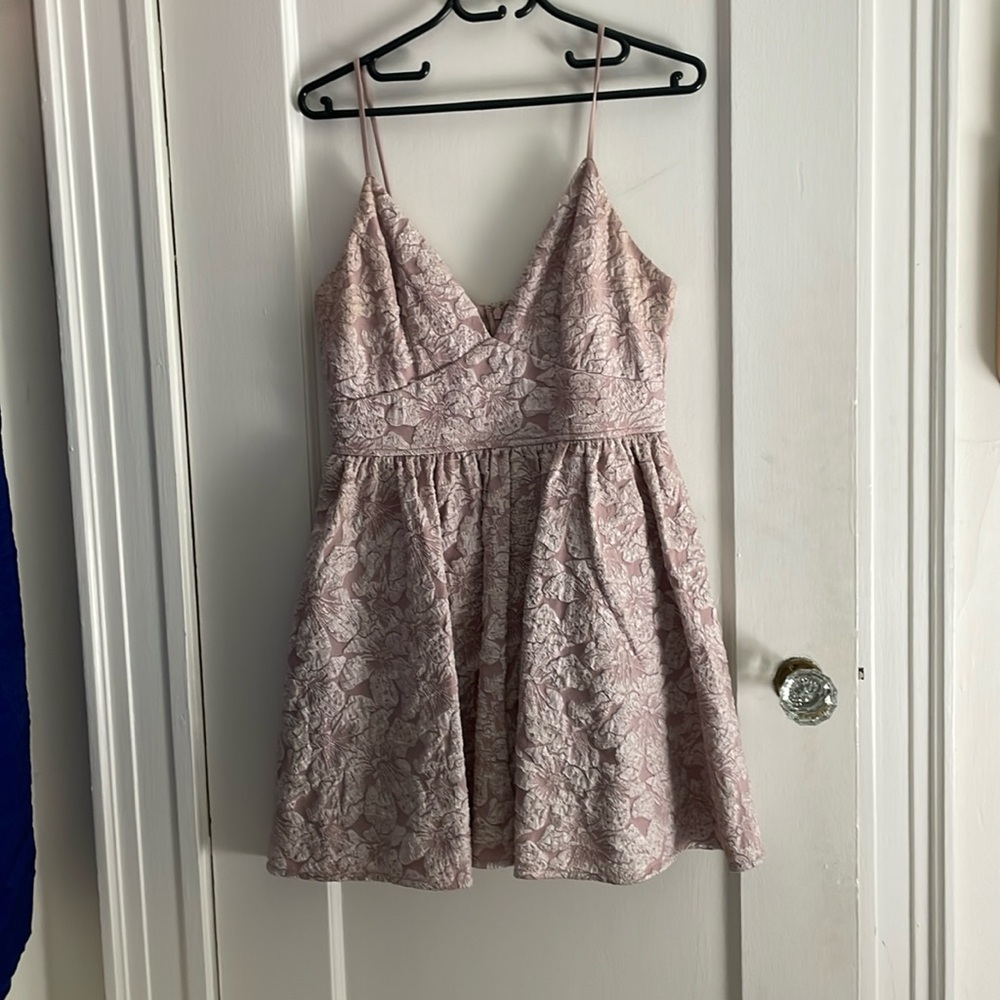 Pink flower covered dress.